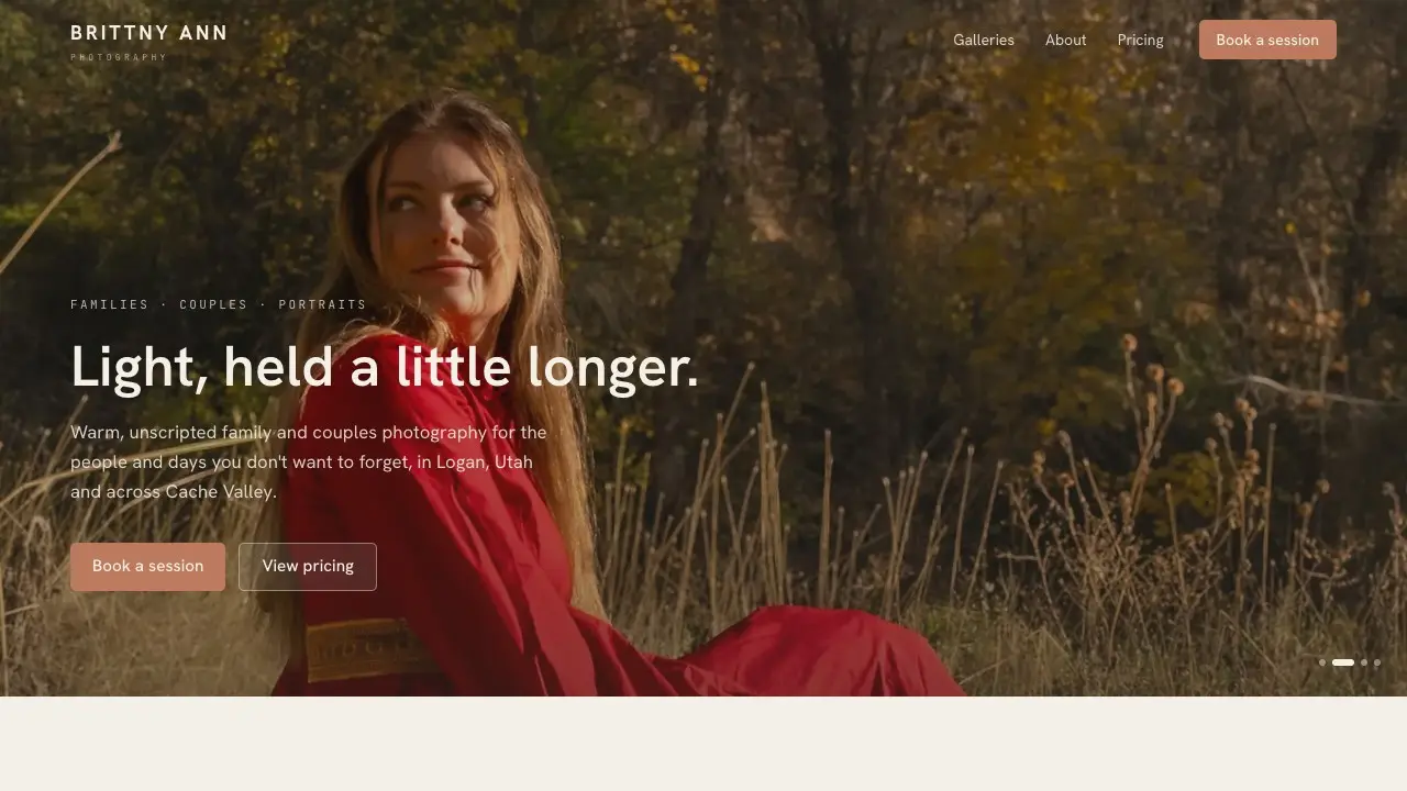 Brittny Ann Photography homepage: a full-bleed autumn portrait behind warm clay buttons and the headline "Light, held a little longer."